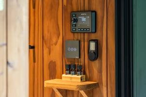 a wooden door with a cell phone on it at Luxury Resort Orava in Orava