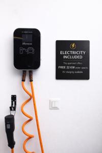 a telephone with a cord hooked up to it at Luxury Rooms Vila Carissa in Malinska