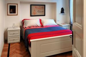 A bed or beds in a room at Casa Brenna Tosatto Art Experience