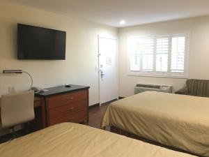 Huone majoituspaikassa Simply Home Inn & Suites - Riverside
