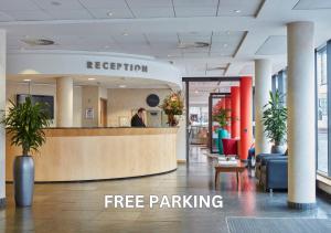 a lobby with a reception desk in a building at Future Inn Bristol in Bristol