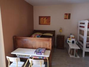 Llit o llits en una habitació de Tin'ida 3 fotos més