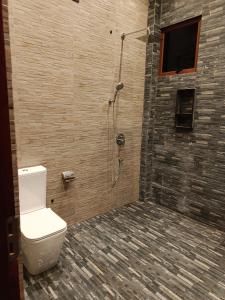a bathroom with a shower with a toilet in it at Isle Weligama in Weligama +37 photos