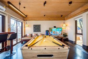 a billiard room with a pool table at Let go see the Dolphin Samroiyot in Baanphakrimlay 