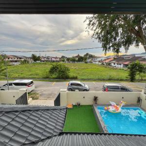 a view of a backyard with a swimming pool at A6886 Swimming Pool Villa in Kuantan