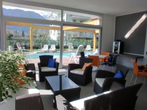 The swimming pool at or close to Residence Rivachiara (check-in at Hotel Riviera in Viale Rovereto, 95)