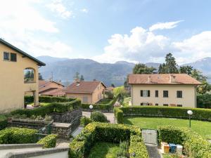 a view of a garden from a house at KG Lierna Lake View in Lierna