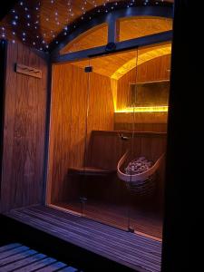 a room with a window with a bowl in it at Chez Marguerite Luxury Shepherd's Hut and Sauna in Holt
