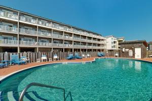 a large swimming pool in front of a hotel at HADS814 Wahoo 814 #102DS-H in Hatteras