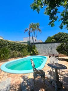 Foto de Casa com piscina e muita natureza