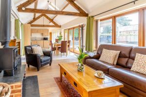 a living room with a couch and a table at 1 Bed in Wonastow oc-l29426 in Wonastow