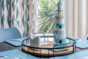 a table with a toy lighthouse on top of it at 1 Bed in Bridlington oc-t30002 in Bridlington