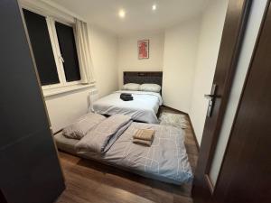a bedroom with two beds in a room at Ubytování Resslova in Ústí nad Labem