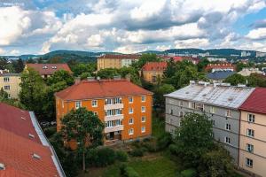 an overhead view of a city with buildings and trees at Ubytování Resslova in Ústí nad Labem