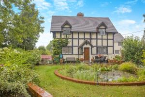 an old house with a garden in front of it at 2 Bed in Woofferton oc-b29941 in Woofferton