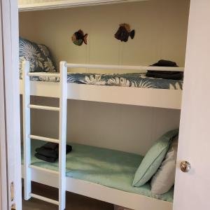 a bunk bed room with two bunk beds at Beach Skybox HHI in Hilton Head Island +53 photos