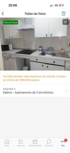 a page of a kitchen with a picture of a stove at Apartamentos Buendia in Buendía