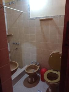 a bathroom with a toilet and a sink at MiskyPacha in Purmamarca