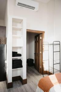 a bedroom with a bunk bed and a closet at The Neighborhood Lofts in Greencastle +12 photos