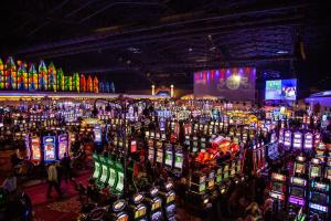 a large room filled with lots of slot machines at Seneca Niagara Resort & Casino in Niagara Falls