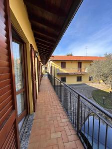 a balcony with a view of a building at Casa vacanze Orchidea in Treviolo