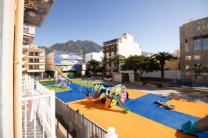 a view of a playground in a city at El Laurel, Remote Work Friendly, City Center in Los Llanos de Aridane