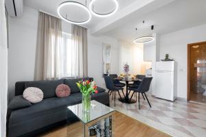 a living room with a couch and a table at Villa Nick in Cavtat