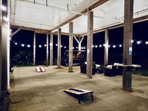 a large building with a table in the middle at Pelican Pointe Home for 10 in Bolivar Peninsula