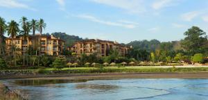 a resort with houses and a body of water at Bella Vista 3F 3 bdr beach club view in Los Suenos in Herradura