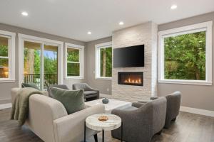 a living room with a couch and a fireplace at Casa Belli in Bellingham
