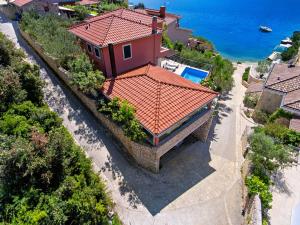an aerial view of a house with a red roof at Villa Kamelicina in Vinišće