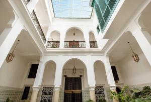 an inside view of a building with a ceiling at Riad Dar Hamid Hotel & Spa in Marrakesh