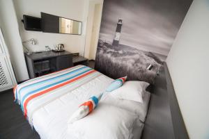 Katil atau katil-katil dalam bilik di Hostal Cabo Mayor