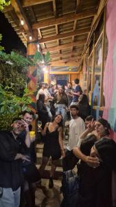 a group of people walking down the stairs of a party at Patagonia Jazz Hostel in San Carlos de Bariloche