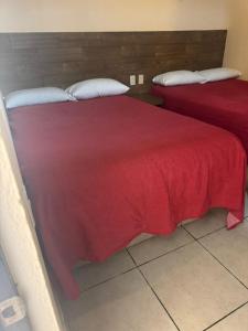 מיטה או מיטות בחדר ב-Hotel Kalin