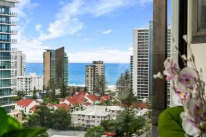 a view of a city with buildings and the ocean at The Enderley Escape in Gold Coast