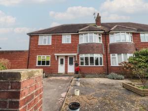 a red brick house with white windows at Seaside Serenity in Lytham St Annes
