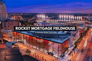a building with a sign that reads rockett mortgage fieldhouse at LUXE Condo Downtown | Security•Gym•Parking in Cleveland