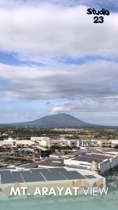 a view of a city with a mountain in the background at Studio B23 Azure North in San Fernando