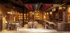 a restaurant with tables and chairs in a room at TIME Restaurant & Homestay Sa Pa in Sapa