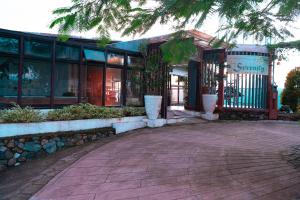 a building with a walkway in front of it at Serenity Busay Room 1 in Cebu City