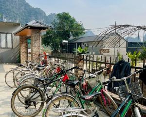 a group of bikes parked next to a fence at Trang An Pristine View Homestay in Ninh Binh