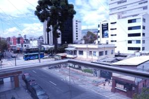 an overhead view of a city street with buildings at Hotel Gool De Guerron in Quito