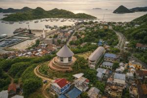 an aerial view of a small town with a harbor at Bajo Hotel in Labuan Bajo