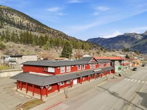 an overhead view of a red building in a town at Lillooet Hotel Victoria in Lillooet
