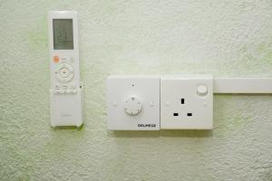 a nintendo wii game system on a wall at Chenudi Villa Ahangama in Ahangama