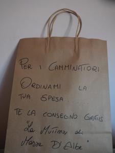 a brown paper bag with writing on it at Alla Fonte in Massa dʼAlbe