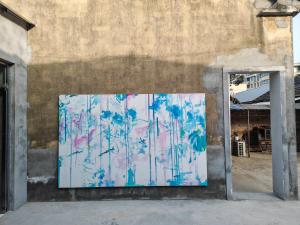 a painting on the side of a building at 天天绘住 in Xianzong