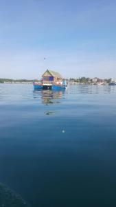 a boat in the middle of a large body of water at Warram mobile in Puerto Princesa City