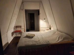 a bedroom with a large white bed in a room at Twinbeach Sanctuary in Mersing +39 photos